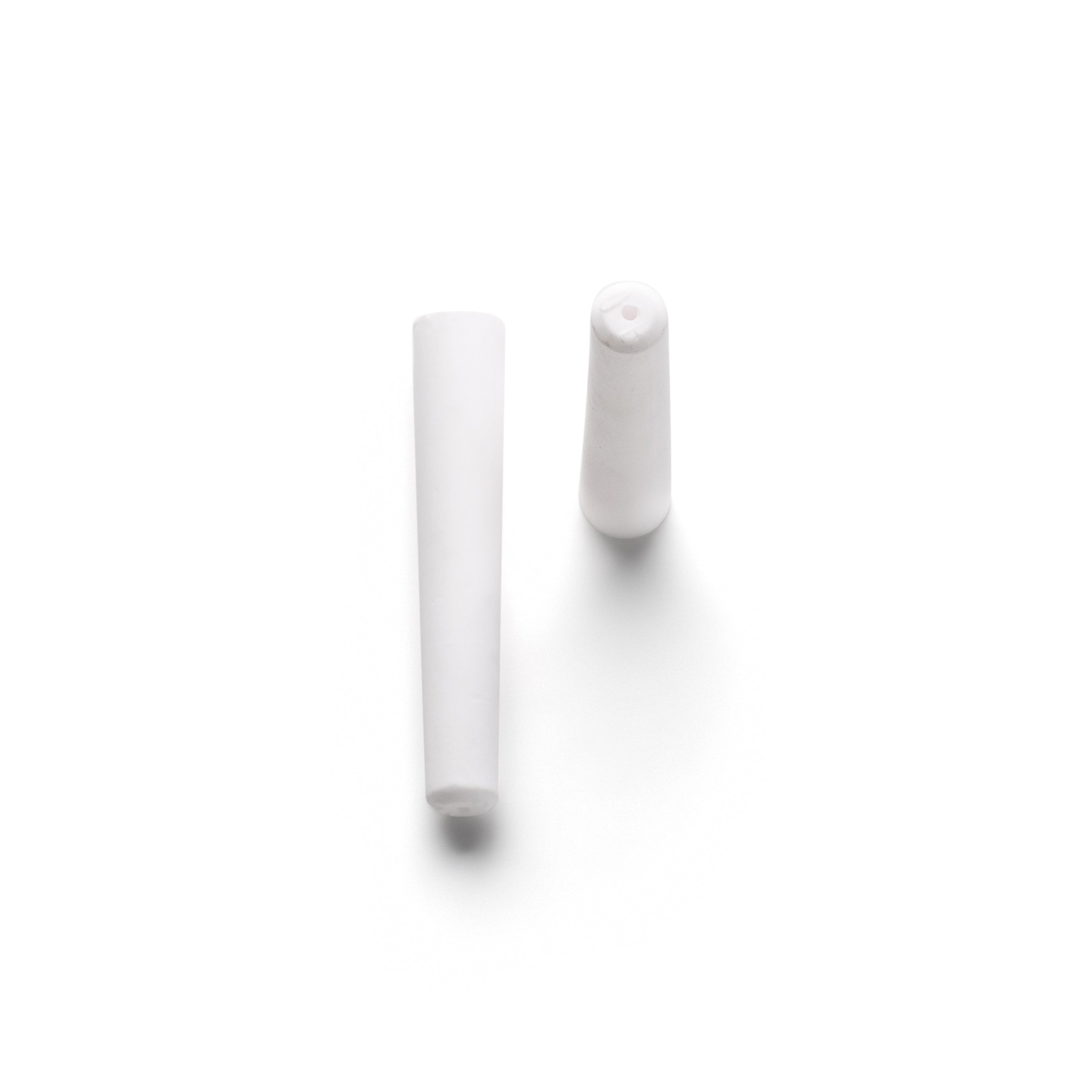 Two white ceramic nozzles for sandblasting, placed against a white background.