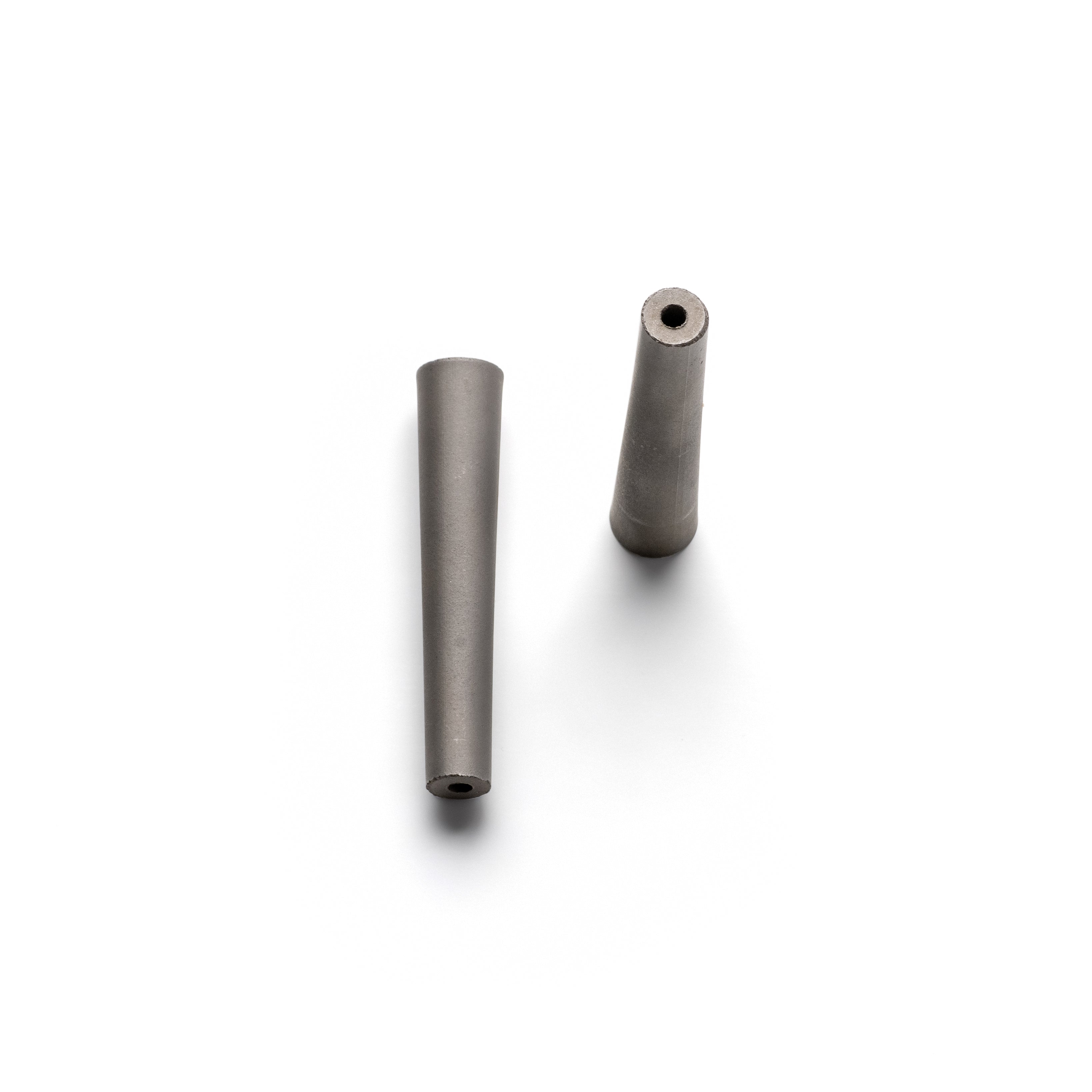 Two tungsten carbide nozzles with a 3mm diameter, designed for sandblasting, placed against a white background.